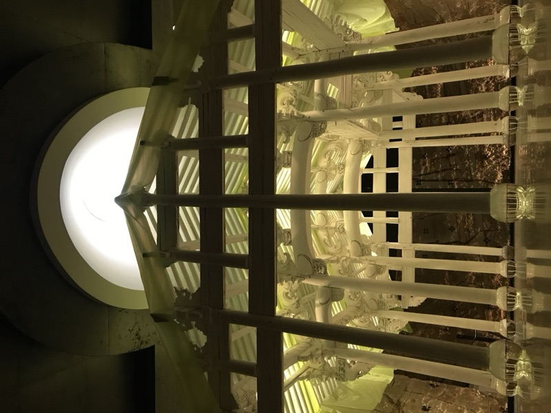 White ornate pavilion sculpture in gallery