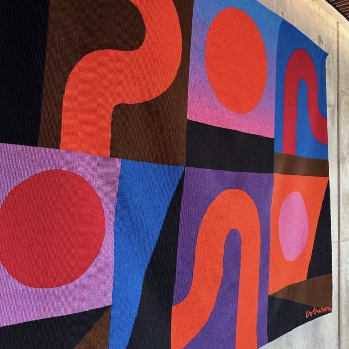 Colorful abstract tapestry in public space