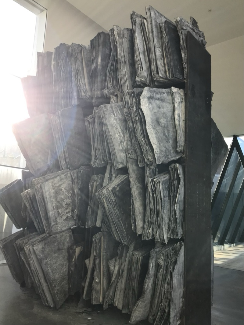 Lead book sculpture detail